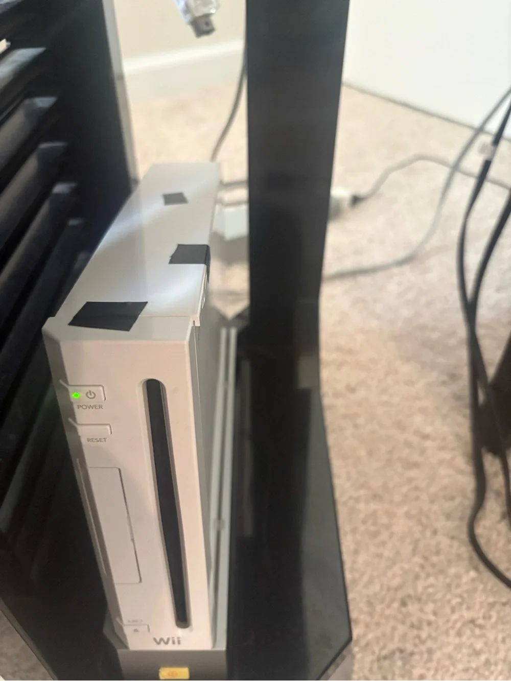 Nintendo Wii Console, games, controllers, and stand bundle